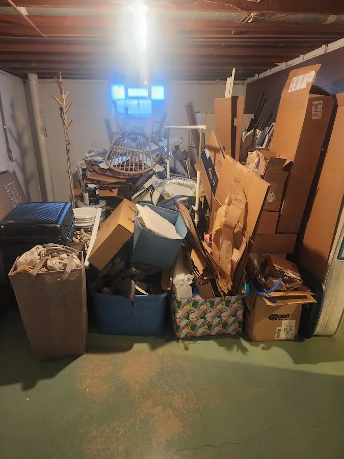 Roll-off dumpster container at job site for 15 Yard Dumpster Rental in Forsyth